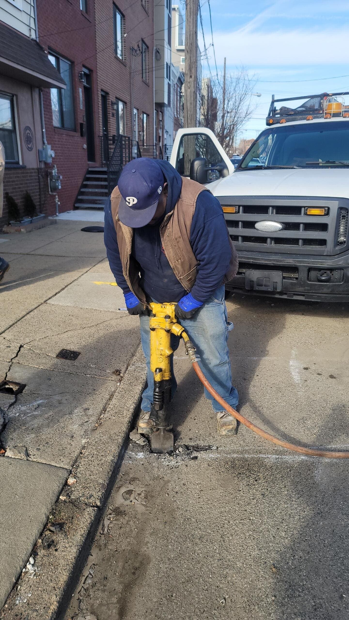 Breaking the curb to reach a buried line